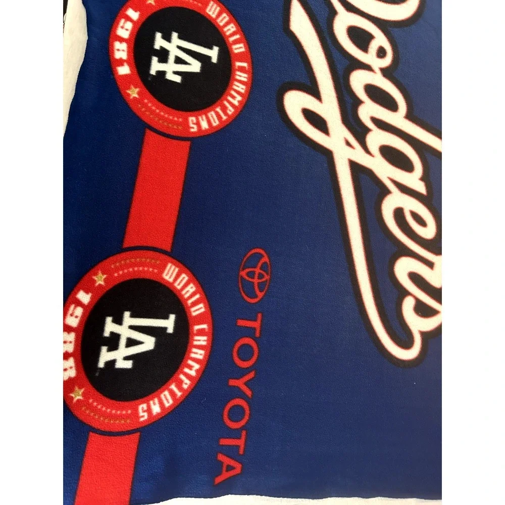 LA Dodgers blanket with logo and list of world series champioships‎